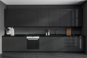 a modern kitchen that is painted black
